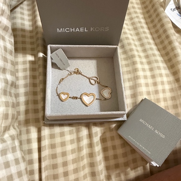 Michael Kors Jewelry - Michael Kors Gold Heart Charm Bracelet with Mother-of-Pearl Inlay